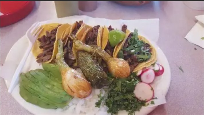 Street tacos with radish, onion and jalapeรฑo